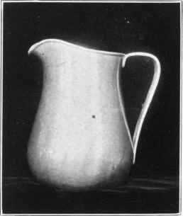 Fig. 120. Seamed silver pitcher.