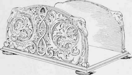 Carved Log Holder.