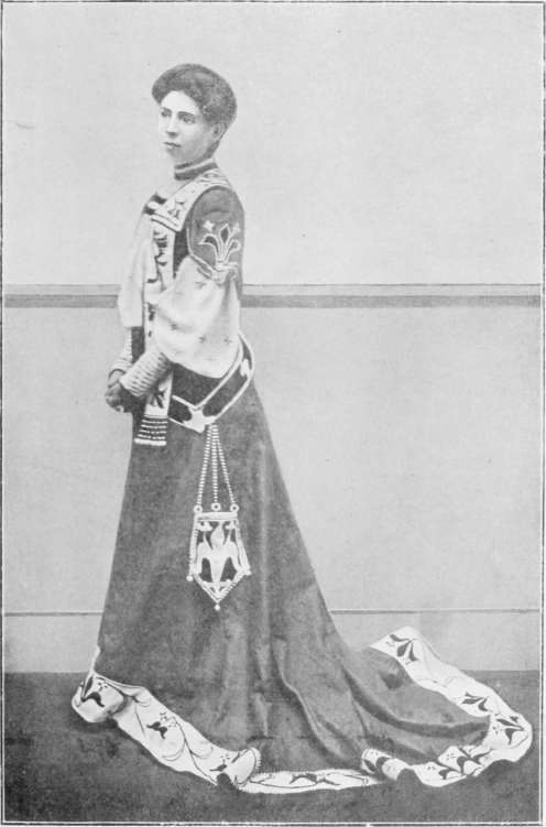 Costume by Walter Crane. Worked by Miss Edith Swinhoe.