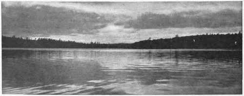 A beautiful Canadian sunset over   Rainy Lake,  near Fort Frances. The shores of this lake form ideal camping grounds during the summer