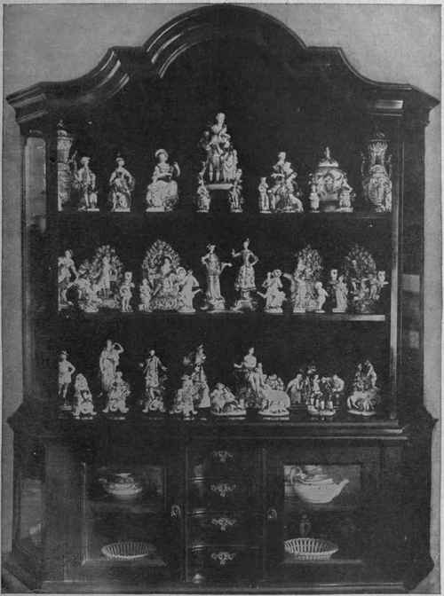 A beautiful Chippendale cabinet, which is the ideal receptacle for valuable old Worcester, Chelsea, and Leeds porcelain