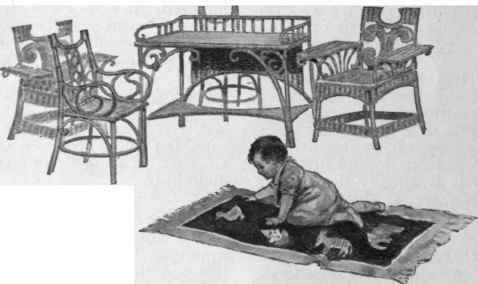 A crawling mat of soft material with appliqued animals and birds cut out of bright hued scraps