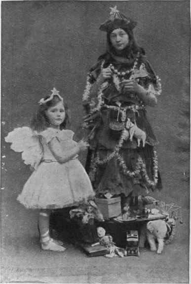 A live Christmas tree with the fairy from the top to distribute the presents