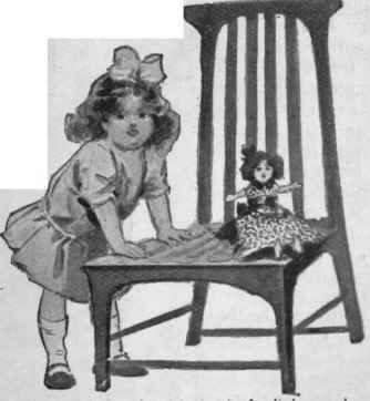 A low chair just the right height for little people to stand at