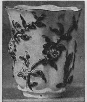 An early Chelsea cup with raised decoration