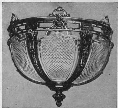 The  reflecting bowl  fitting, which throws most of the light up to the ceiling, so that it is diffused softly about the room