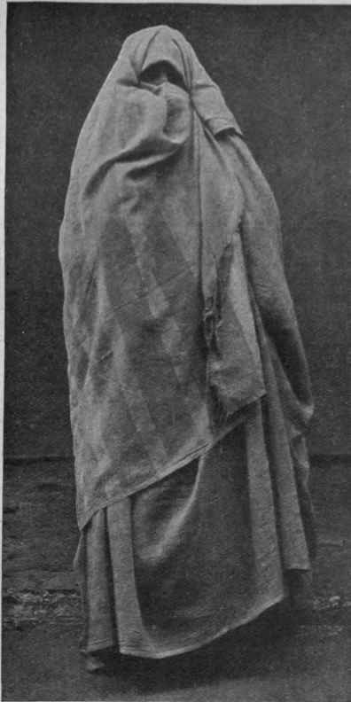 A Moorish woman of the upper classes wearing the all enveloping veil of thin silk