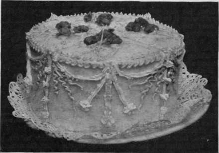 Cake decorated With various pipes, Ribbon, Plain, etc.