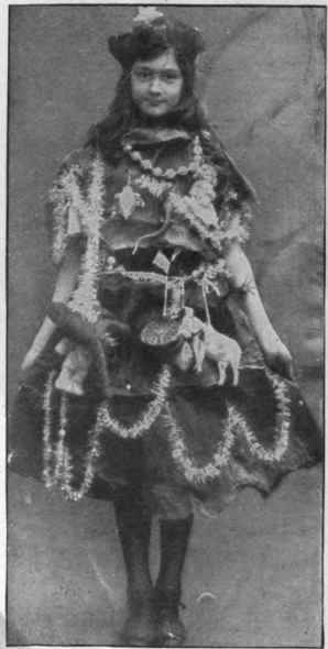 A Christmas tree. This costume is of stiff dark green muslin over sateen. If necessary, crinkled paper could be substituted for muslin