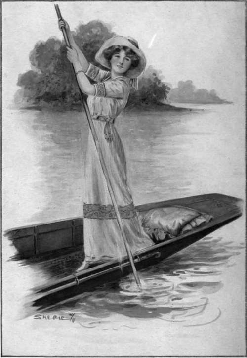 An English girl is seen at her best on the river in a simple but charming tub frock of linen