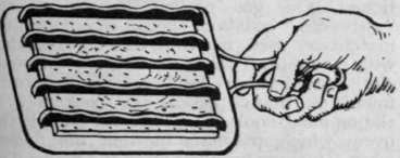 Fig 4. A handy toaster, ' for toasting one slice of bread at a time. This costs sixpence only