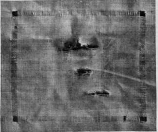 Fig I. Draw threads from both ways of the material to form a square around the damaged portion