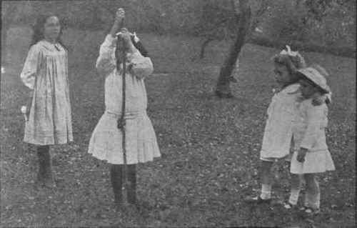 First position for rope climbing. The right hand is held as high as possible. The left foot is ready to rise