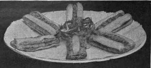 Lobster fingers. The contrasting colours of the butters used in this savoury are very effective and pretty