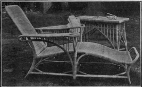 Lotus Eater. A lounge chair of this kind is ideal for garden use, and the receptacle attached is useful for holding books and papers'