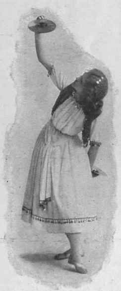 Step 2. Fig. 2. The dancer looks at her reflection in the cymbal as she walks across the room