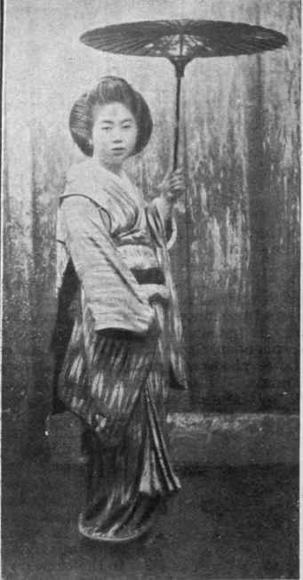 A Japanese girl of the upper classes. Such little maidens wear the gayest and brightest garments