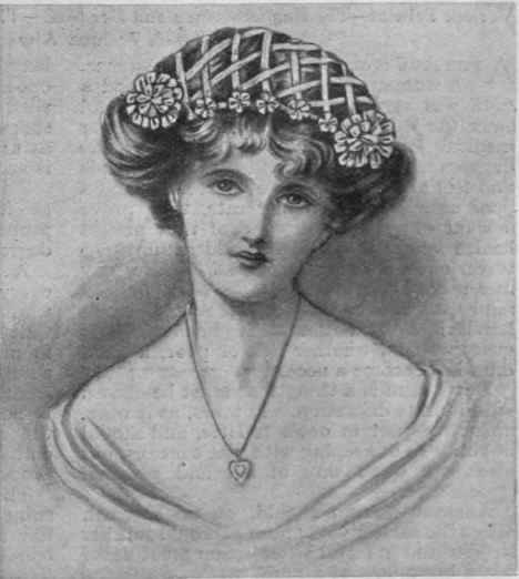 A becoming little cap of silver braid finished with pink rosebuds and having a conventional flower of the braid at each side