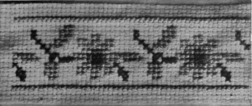 A bold, effective pattern for a border in cross stitch. This embroidery is admirably suited for trimming children's frocks and tunics