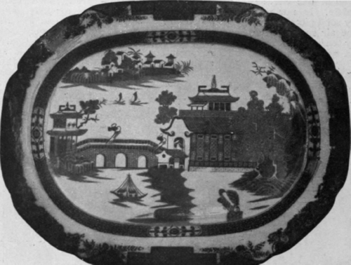 A fine willow pattern dish which would make a charming note of colour on a white wall or upon an oak dresser in a dining room