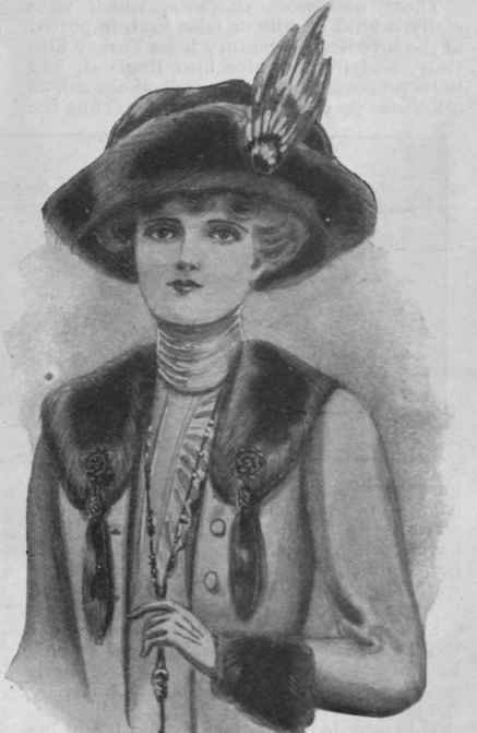A handsome fur collar and cuffs made from an old stole, and worn on a coat of fawn boxcloth. The collar should be finished with braid ornaments and tails