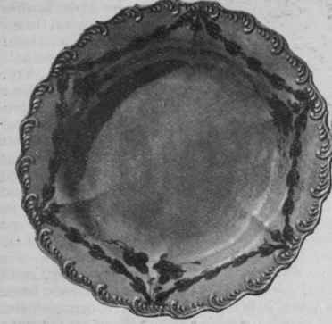 A plate and a dish of Leeds ware, of beautiful design and colouring.