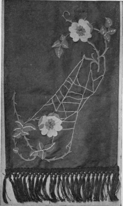 A suggestion for a chair back. The stems are cut from thin leather, the spider's web being worked in silver thread