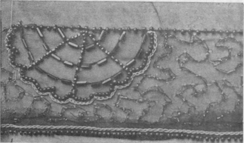 Black chiffon, ornamented with a running pattern of silk, and spiders' webs in bugles and beads, forms a handsome edging for the neck and sleeves of a gown