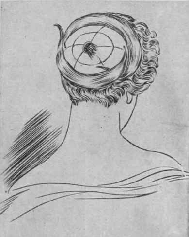 The light circular pad. with a centre hole, on which the puffs of the coiffure are arranged