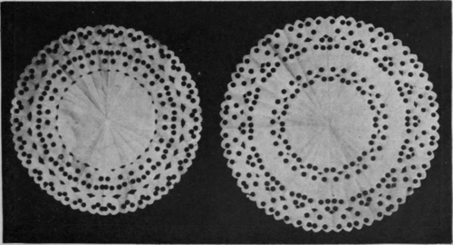 Two circular d'oyleys for cake or bread and butter plates