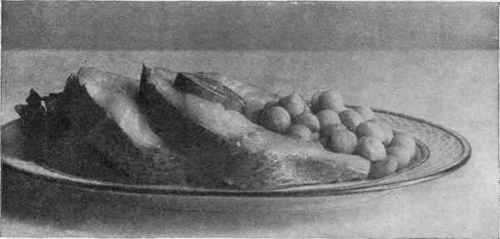 Fish Steaks Sauted Or Boiled, Garnished With Potato Balls, Water Cress, And Lemon.