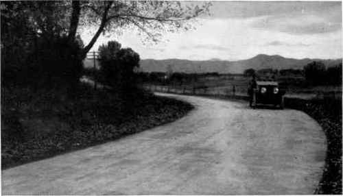 Concrete roads like this may cost a little more than some other kinds in the beginning, but they are cheaper in the end than any other road. There are thousands of miles like this in the United States.