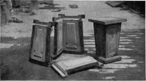 Forms removed from a concrete pedestal to illustrate both forms and finished object.