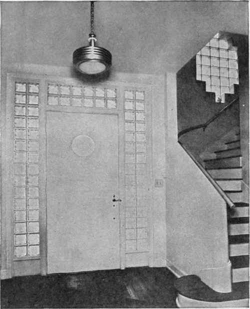 Entrance halls and foyers are difficult areas at best, but when they are treated as shown here, they become features of the house and add much to the general air of good taste