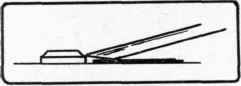 Fig. 140. Method of trimming arris on dowel pin.