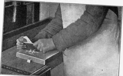 Fig. 58.   Method Of Grasping The Scraper When Working Upon A Broad Surface.