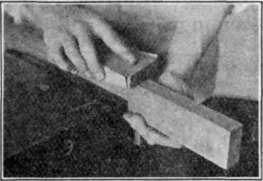 Fig. 93. Sandpapering Flat Surface