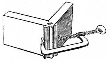 Fig. 116.   Cramping a Tongued and Grooved Mitre.