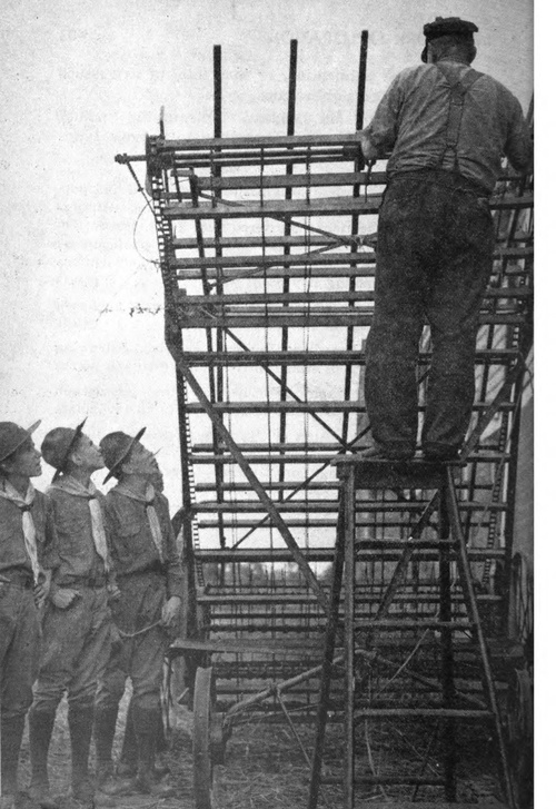 Cubs observing how to operate mechinary