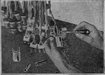 Fig. 6. Operator Assembling Switch Plugs