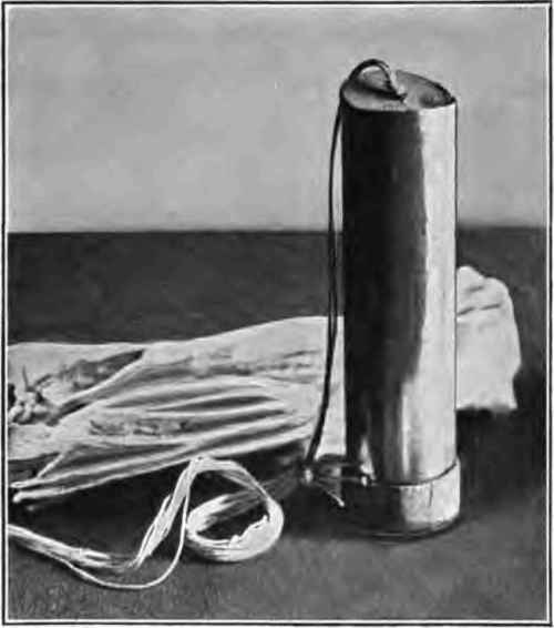 Asbestos cord and protecting wad.