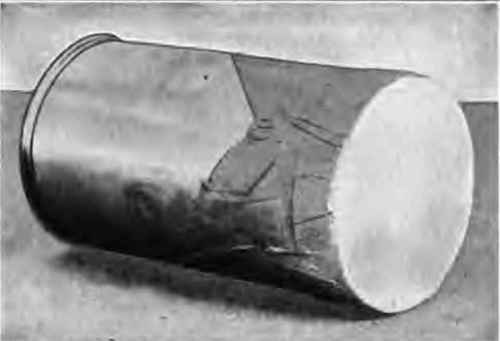 Case showing drumhead in position.