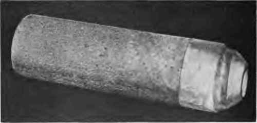 Rocket head showing band holding identification plug in position.